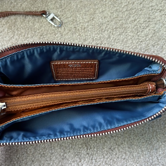 Tumi wristlet with crossbody strap. - Picture 5 of 8